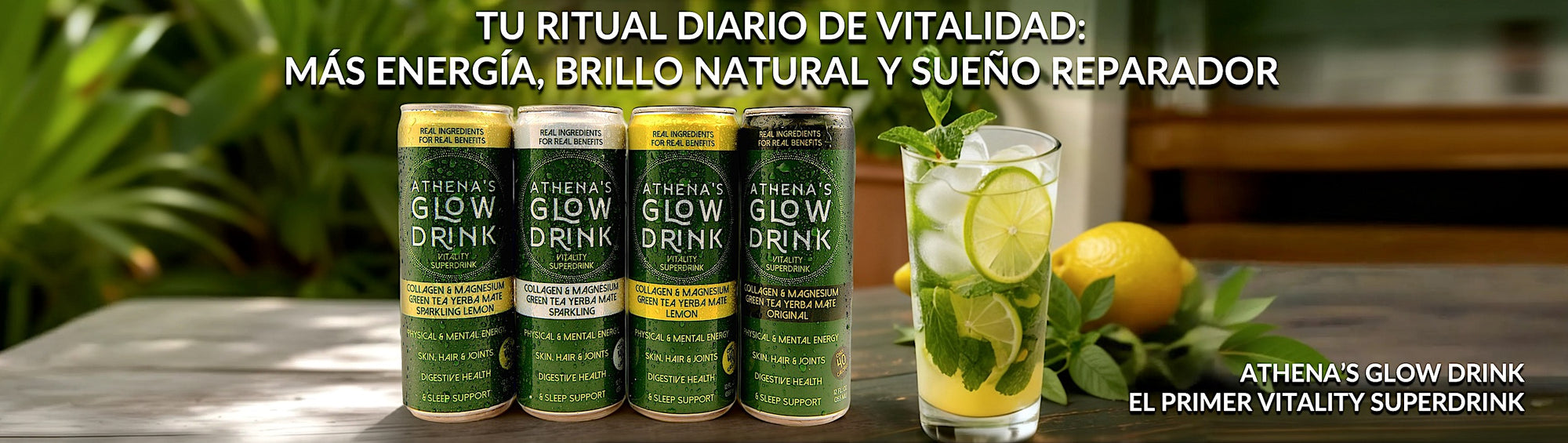 Four cans of Athena's Glow Drink on a table with a glass of a mocktail garnished with lime and lemon, set against a blurred natural background.