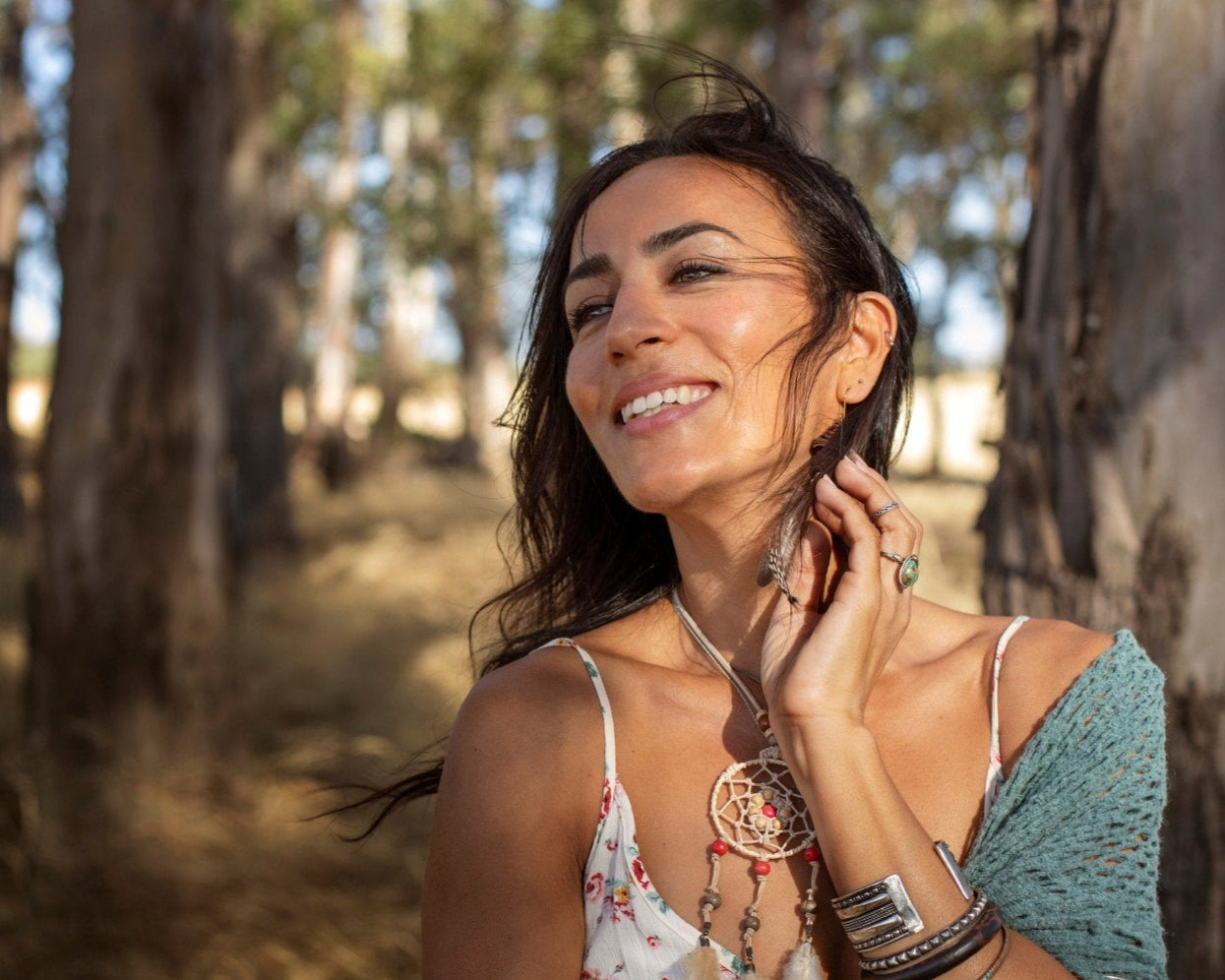 Boho woman in the woods