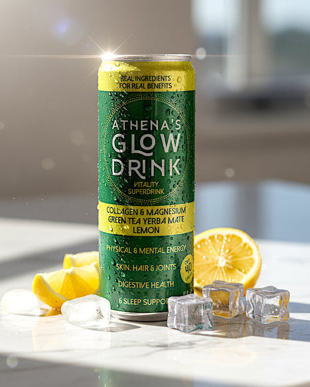 Athena's Glow Drink Lemon can with lemons and ice cubes on a reflective surface